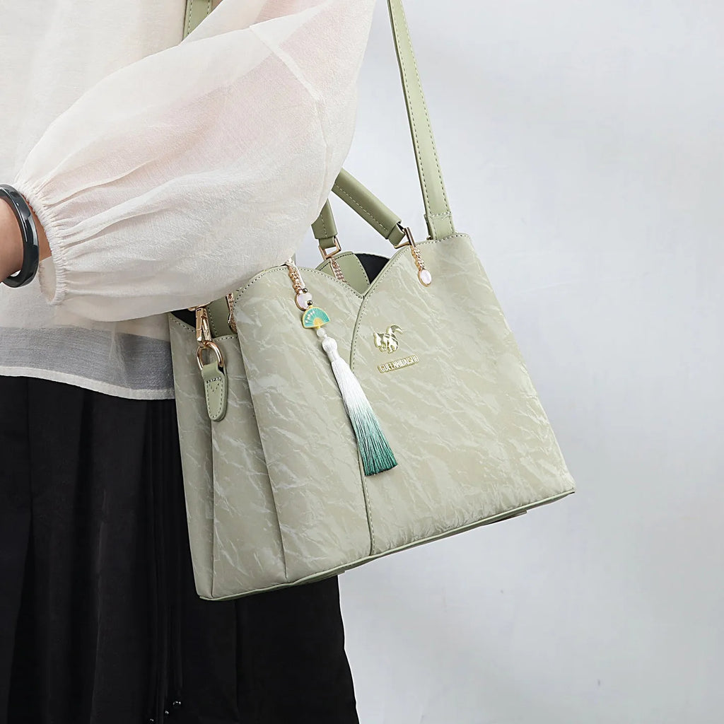 Women's soft PU messenger bag in horizontal square shape with sewing thread detailing