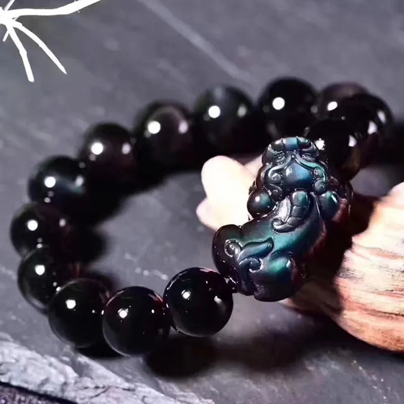 Natural ice colour eye obsidian crystal bracelet with polished round beads on wrist