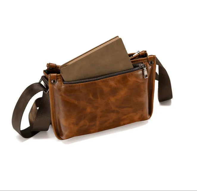 Brown genuine leather men's crossbody messenger bag with large capacity for daily wear