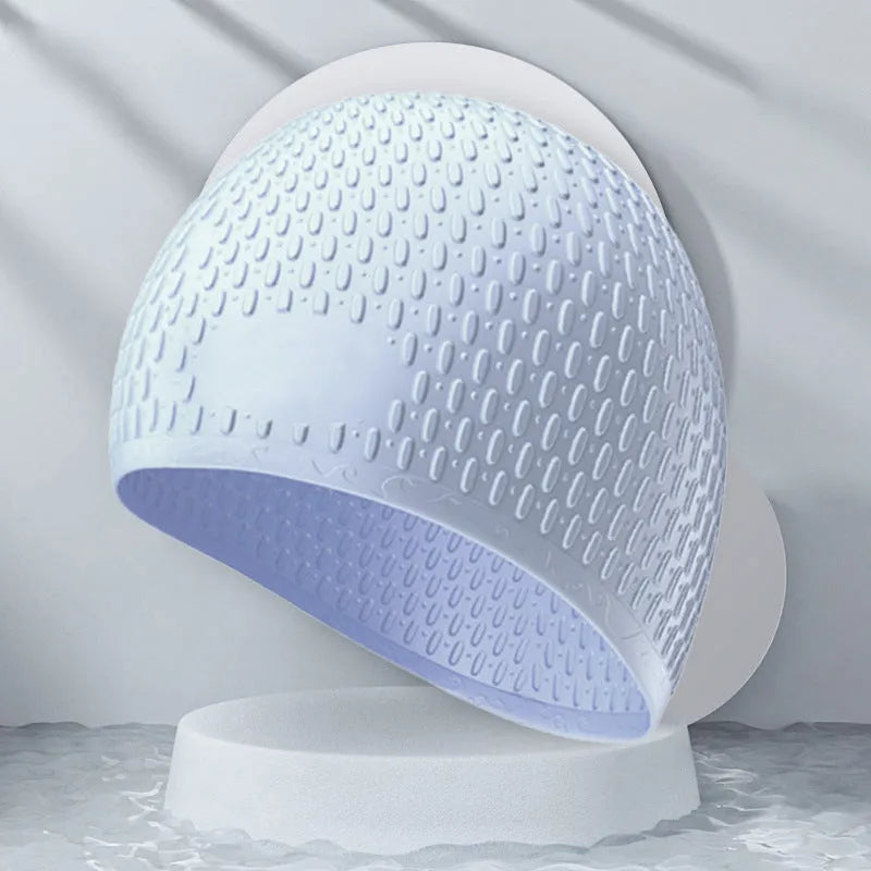 Solid colour silicone swimming cap with water drop design for adult swimmers
