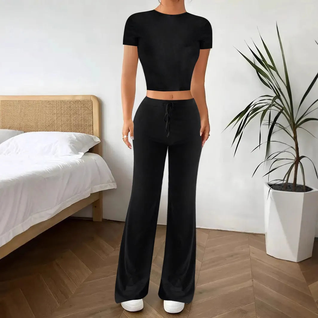 Black high waist trousers and matching short sleeve t-shirt set on hanger