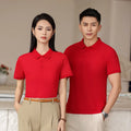 Men's short sleeve polo shirt in long-staple cotton, shown in emerald green with a slit hem.