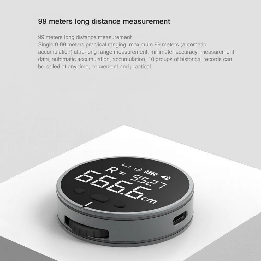 Black electronic measuring ruler with LCD screen, 53mm diameter, 35g, aluminium alloy and silicone body.