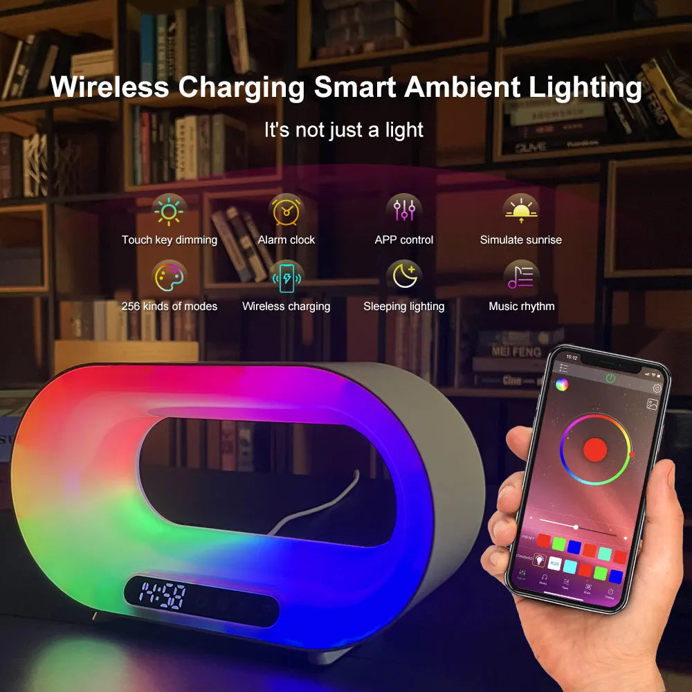 White multifunctional 3-in-1 LED night light with app control, RGB atmosphere lamp, wireless charger, and alarm clock on a desk