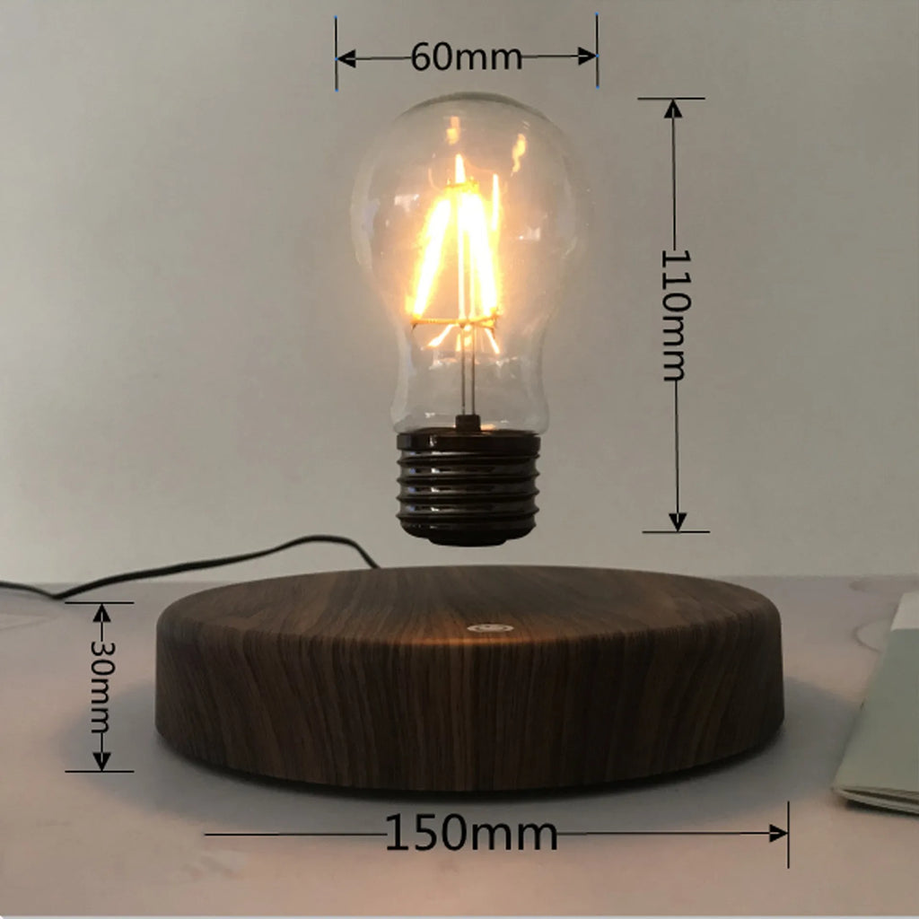 Magnetic levitation bulb night light in solid wood colour floating above desktop base