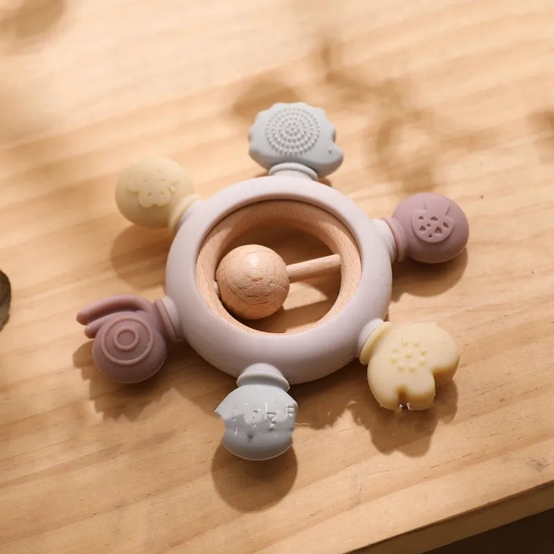 Baby's molars silicone yaoyaole teether rattle toy in pink, edible material for hand sucking prevention