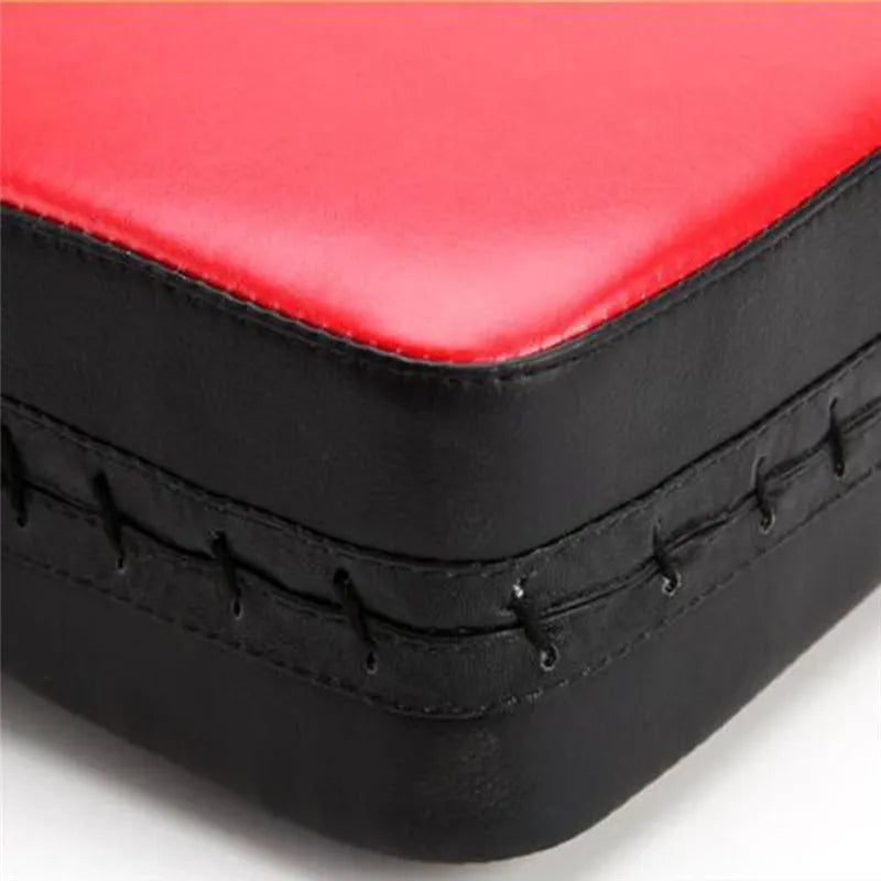 Blue vertical Sanda training target pad for kicking and striking practice.