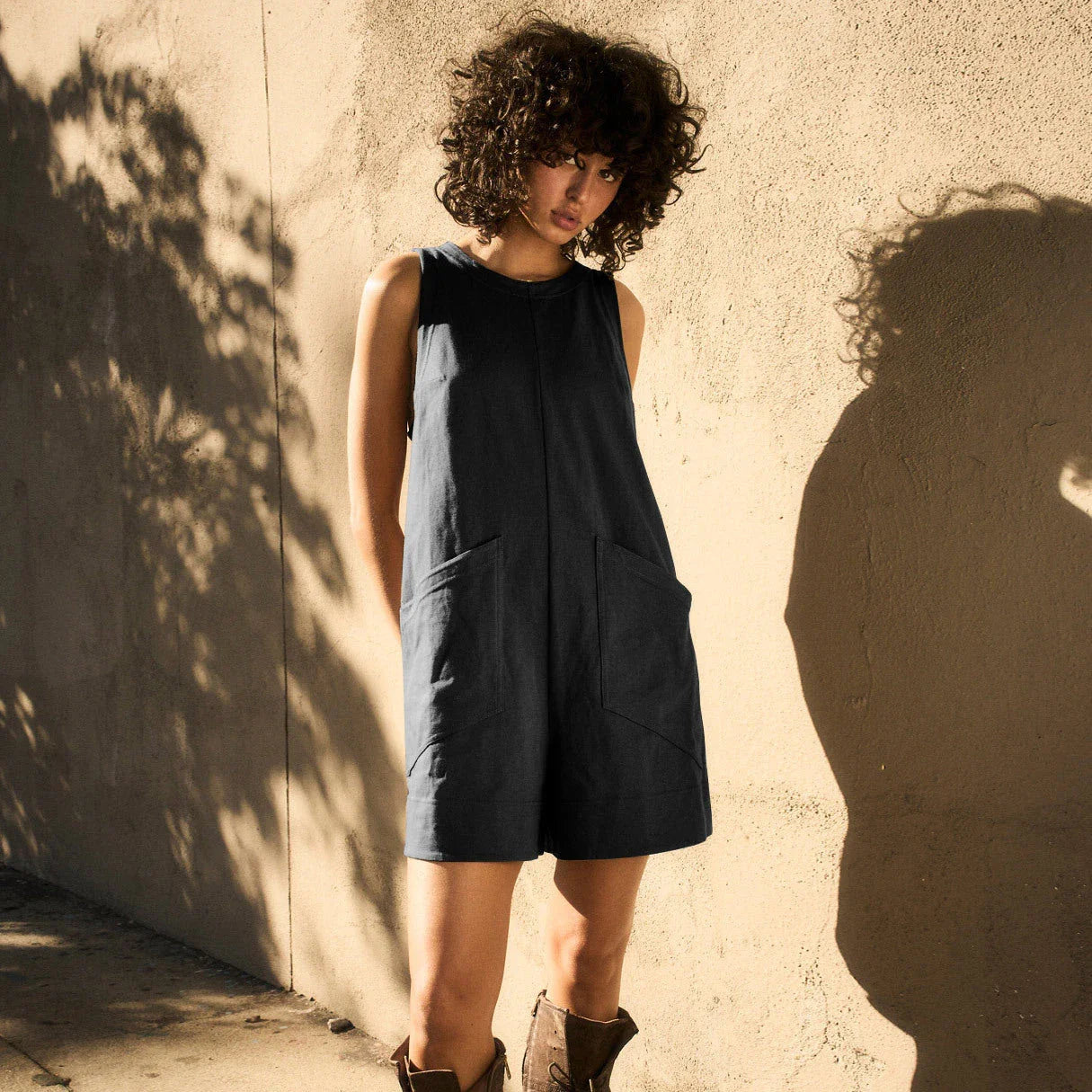 Stylish summer jumpsuit with pockets, cargo shorts, and a relaxed, comfortable design