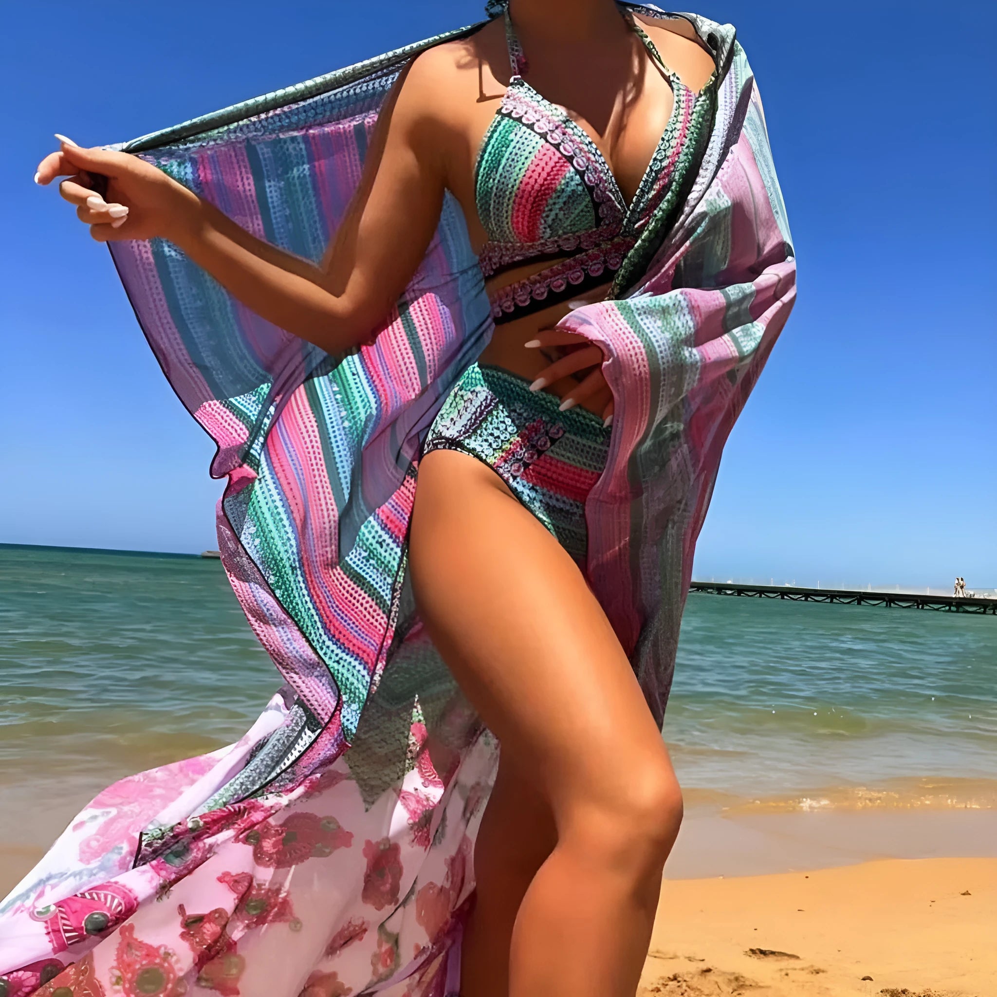 Women's blue cross bandage swimsuit three-piece set with high waist briefs showing veil split detail