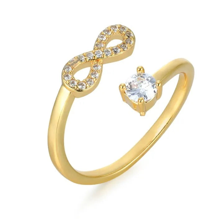 Personalised geometric open ring with zircon and diamond accent showing a letter 'A' in a gold metal finish.