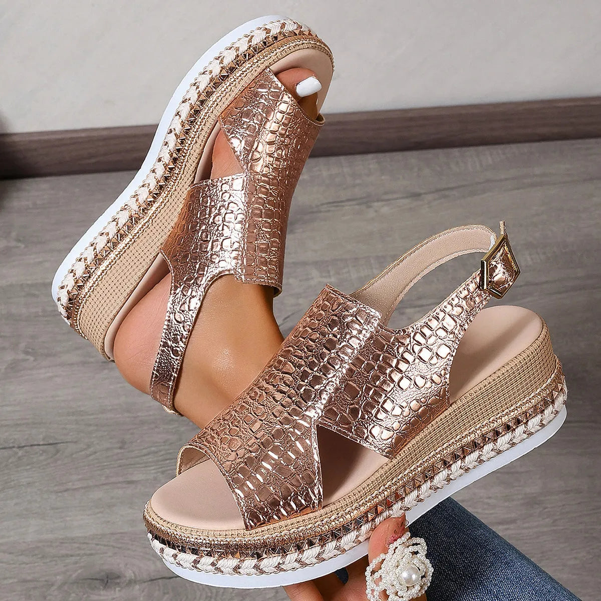 Gold women's Roman sandals with round toe, openwork design and ankle buckle strap