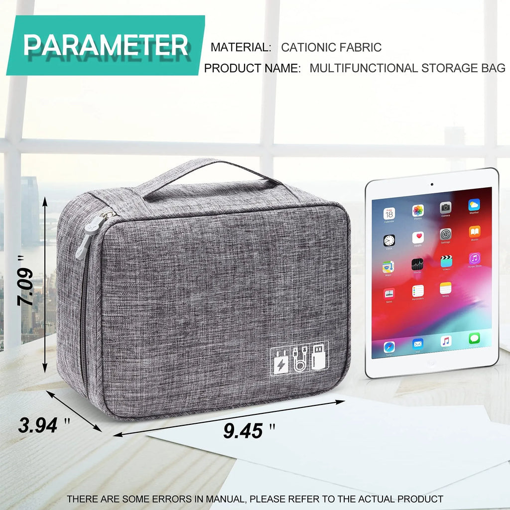 Black and grey waterproof travel cable organiser bag open, showing mesh pockets and removable padded dividers inside.