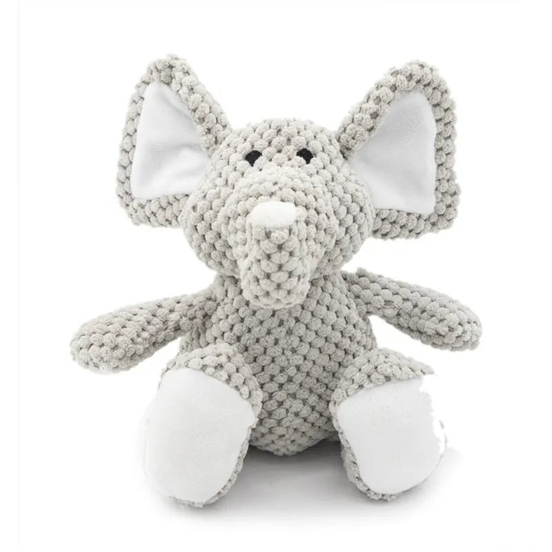 Soft plush dog chew toy in animal shape with internal squeaker for teeth cleaning and play.