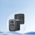 Universal travel adapter UA12 with 4 outlets and USB ports, black, 70x64x48mm