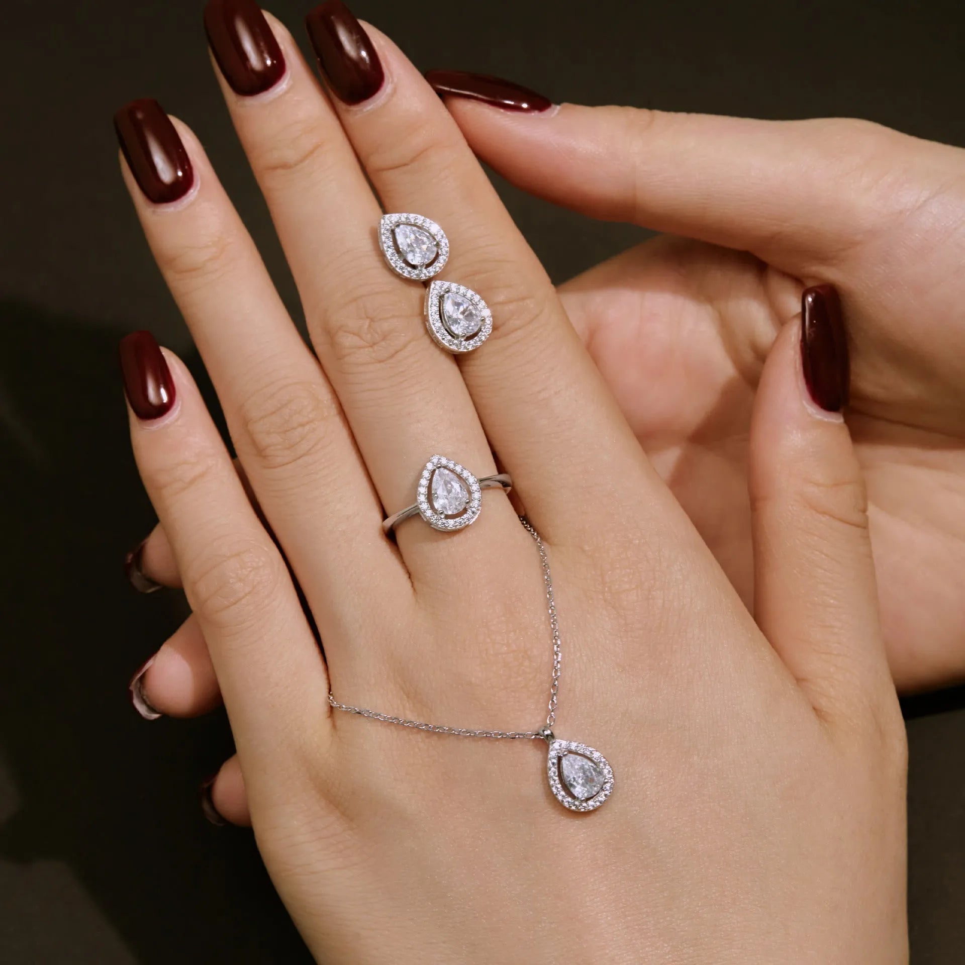S925 sterling silver ring with drop-shaped diamond zircon stone in light luxury style, available in UK sizes No 5 to No 9