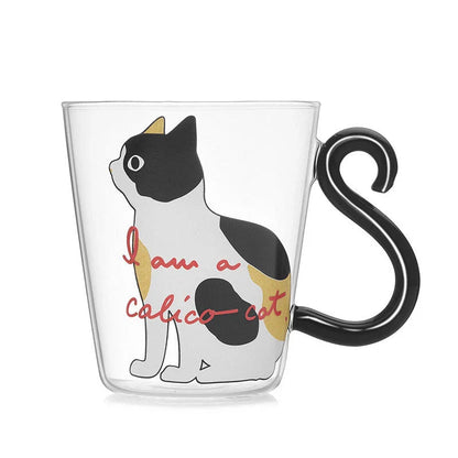 Adorable cat-shaped glass mug with a playful cat tail handle, perfect for coffee, tea, and juice lovers