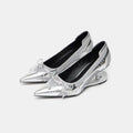 Black women's pointed toe Mary Jane shoes with a floating shaped heel and slip-on design.