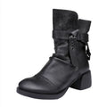 Women's black retro ankle boots with a chunky heel and genuine leather upper.