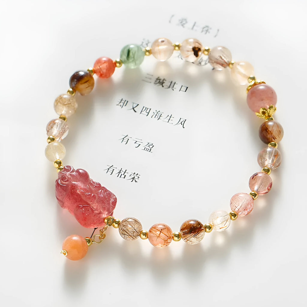 Strawberry quartz crystal bracelet with copper construction and pearl accents in dopamine crystal colour