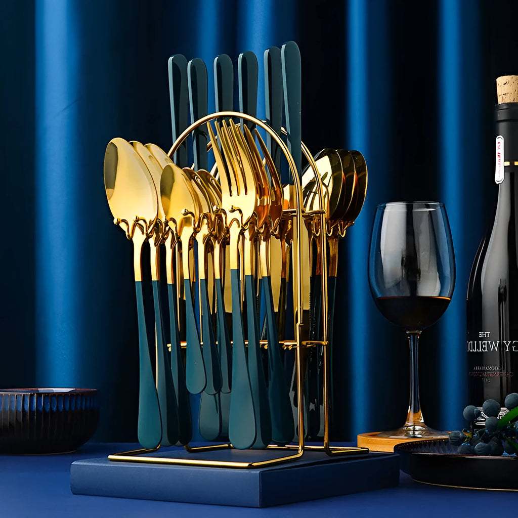 24-piece gold stainless steel cutlery set with knives, forks, spoons and a storage rack.
