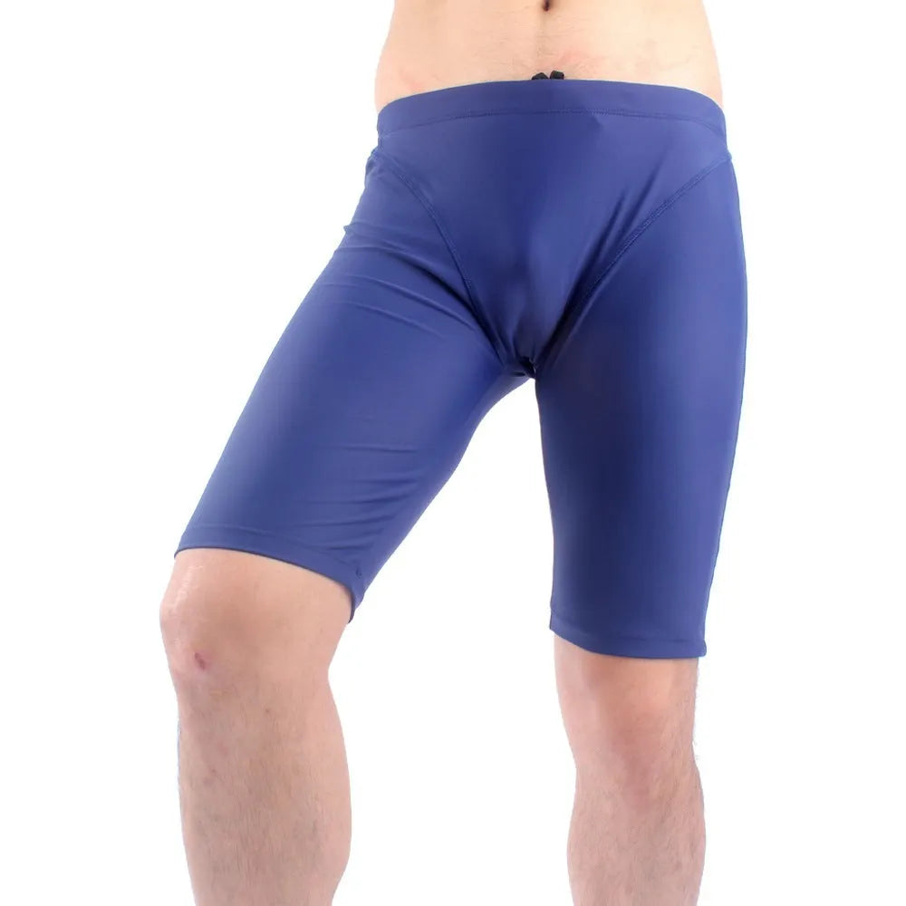 Men's green and navy blue swimming trunks with quick-dry fabric and anti-embarrassment lining