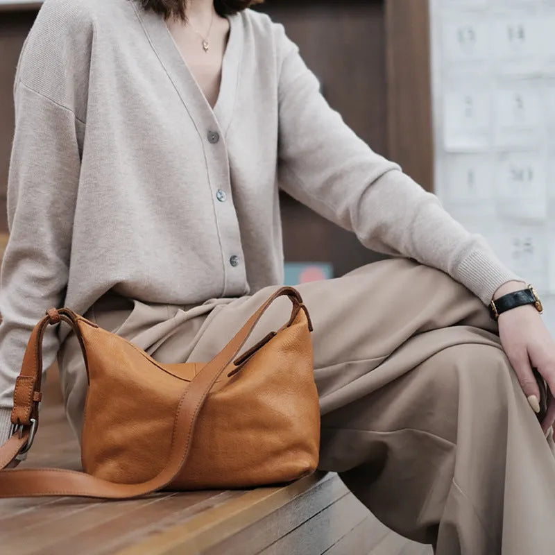 Genuine leather dumpling shoulder bag with wide strap in retro tan or retro black for women daily wear