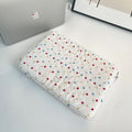Polka dot women's laptop bag with storage compartments available in three size options