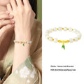 Gold Zhizhu Hetian jade bracelet with 925 silver and 6mm leaf-shaped beads in bamboo design