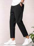 Men's slim fit ankle length trousers in black polyester, tapered leg, mid waist, cropped cut.