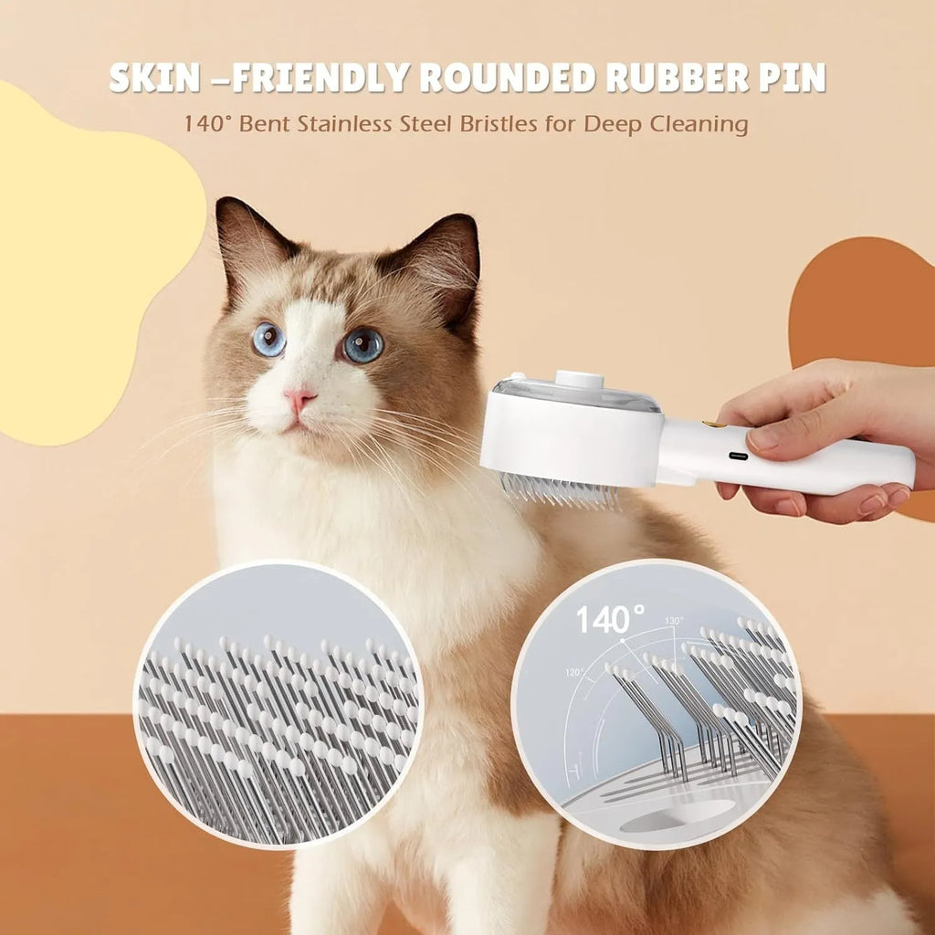 Pink and white cat grooming steam brush with mist function, rounded head, and stainless steel bristles.