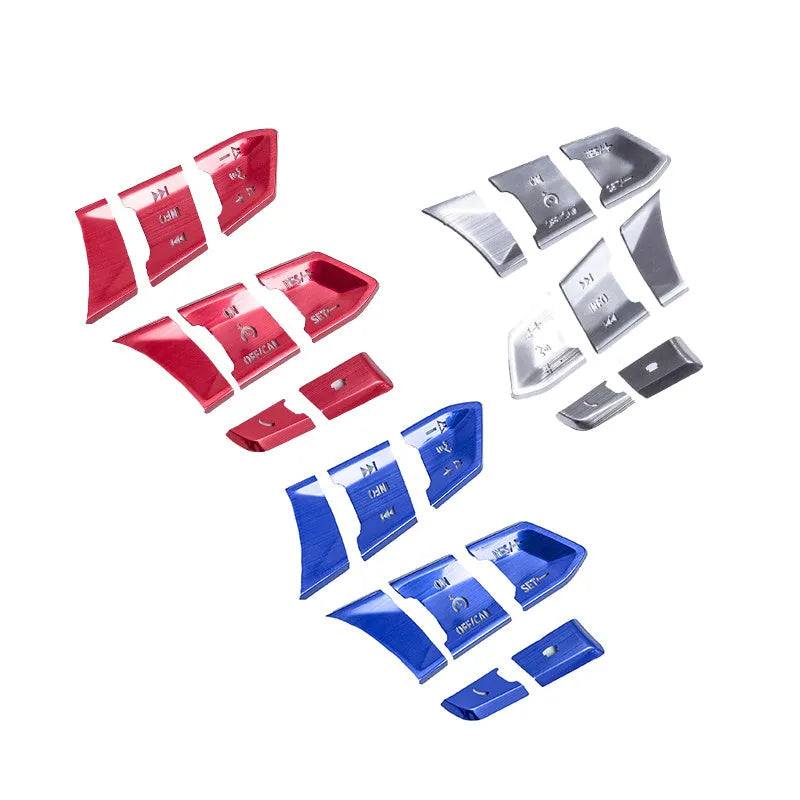 Aluminium alloy decorative steering wheel stickers with transparent button covers in brushed red, silver, and blue colours