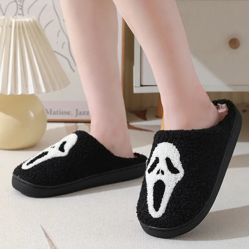Halloween skull print indoor slippers with suede upper, cotton lining, and non-slip rubber sole in white, red, black, or red black.