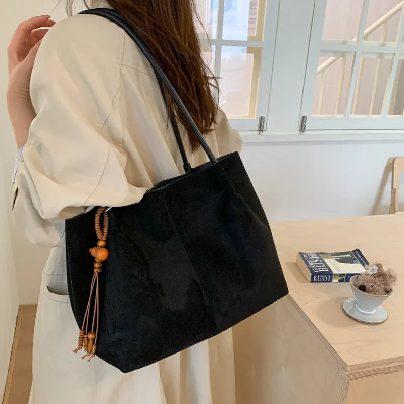 Large capacity suede tote bag in horizontal square shape with single shoulder strap, available in green with matching pendant
