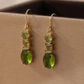 Green geometric quadrilateral copper earrings with retro Bohemian style