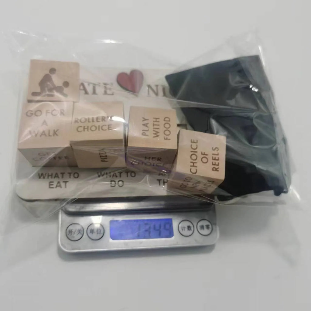 Wooden date night dice game set for couples showing five dice, a wooden planner board and a black storage bag.