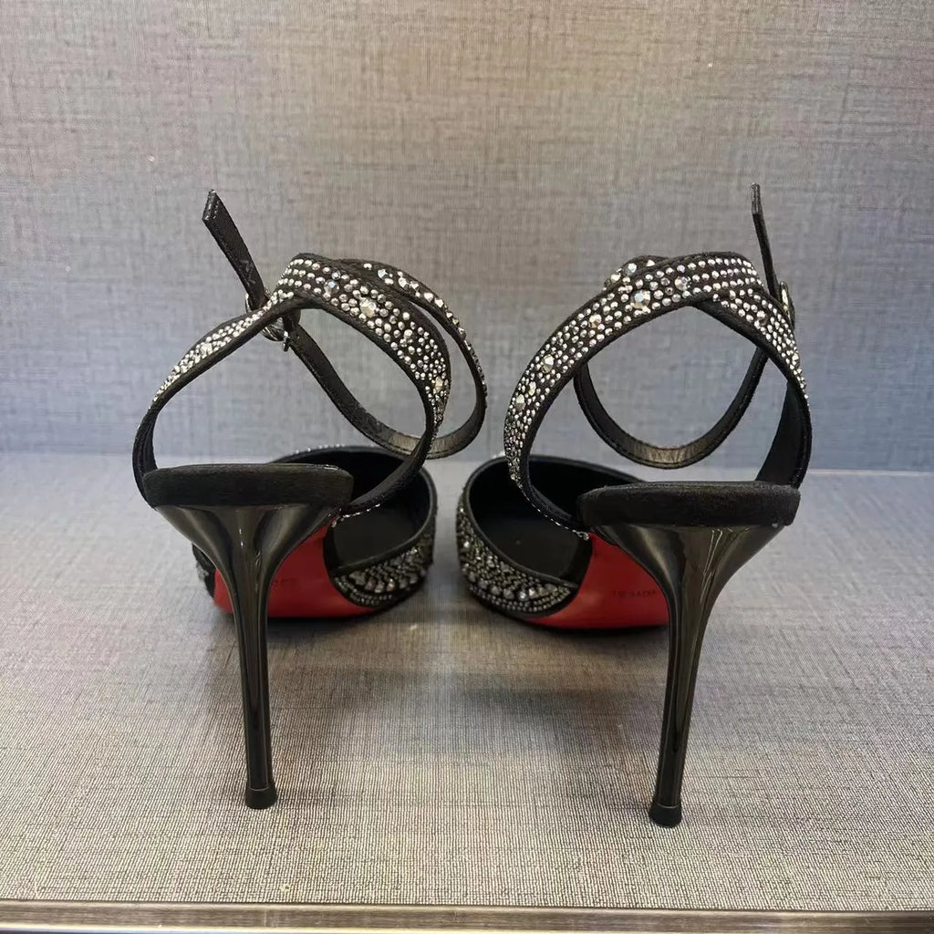 Women's hollow high heels with red sole, stiletto heel and pointed toe in black colour