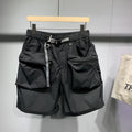 Men's black workwear shorts with multiple pockets and loose fitting design