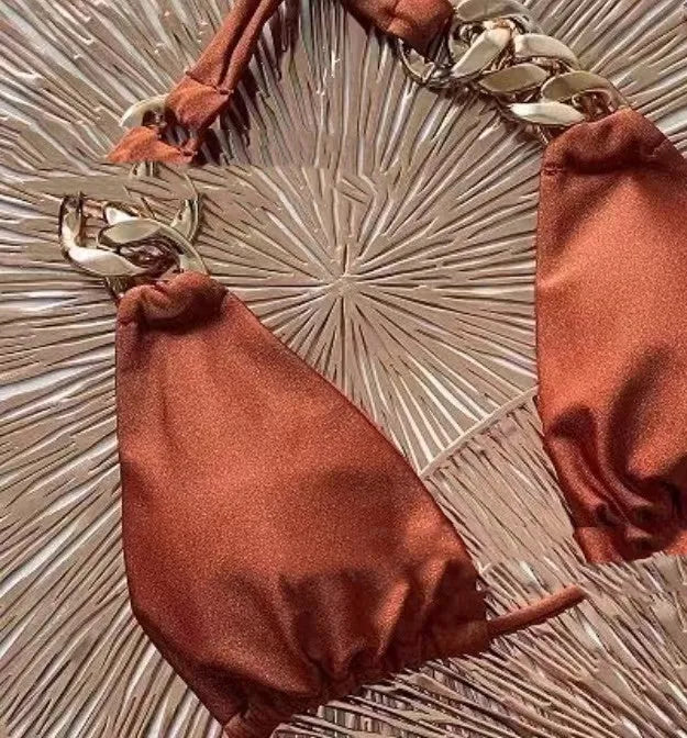Brown women's tube-top bikini with an adjustable ring-tether halter neck.