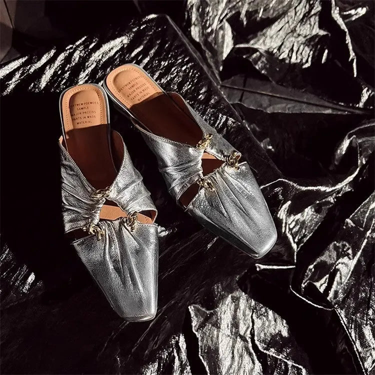 Genuine leather women's square toe slippers in beige, low heel, shown from side.