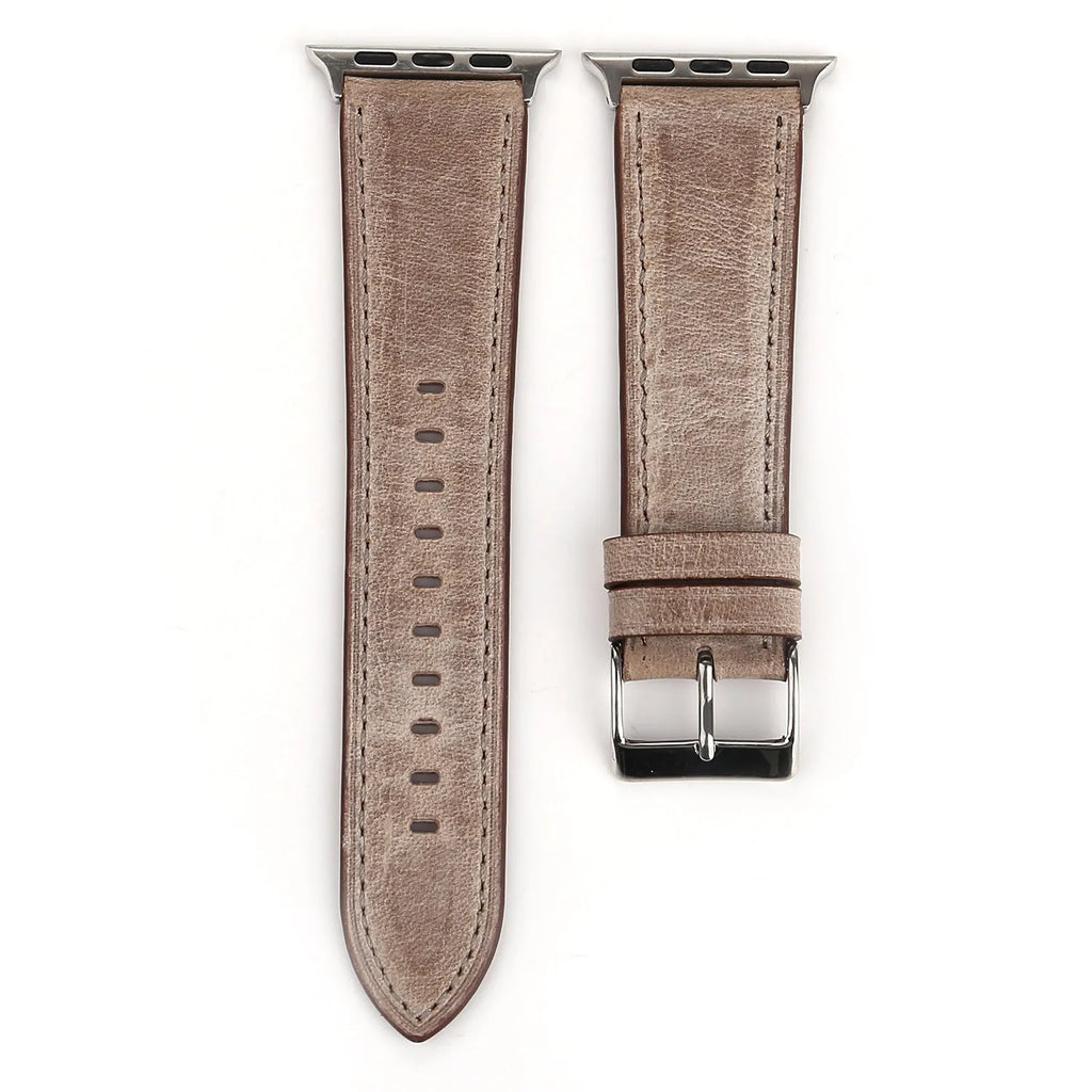 Coloured leather watch strap with a folding buckle on a watch case.