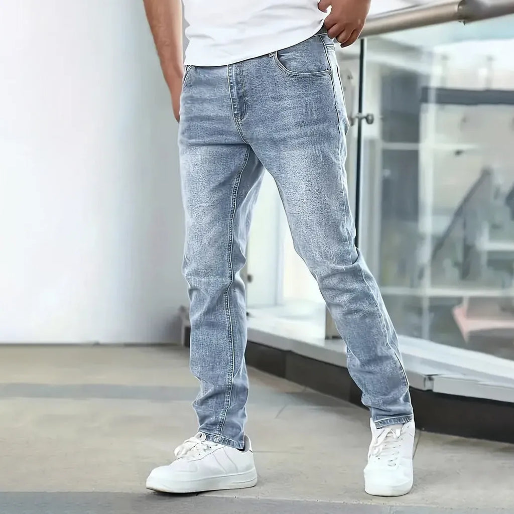 Men's straight leg skinny fit stretch jeans in black, grey and dark blue colours showing front and back views