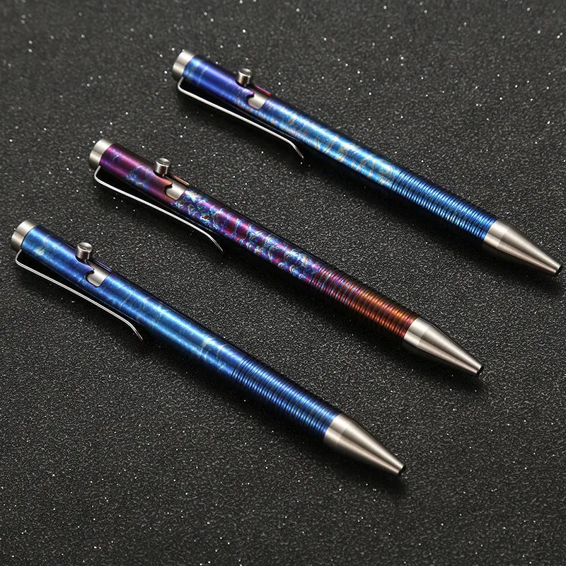 Titanium alloy bolt action ballpoint pen with magic colour phantom finish showing gun bolt handle detail.