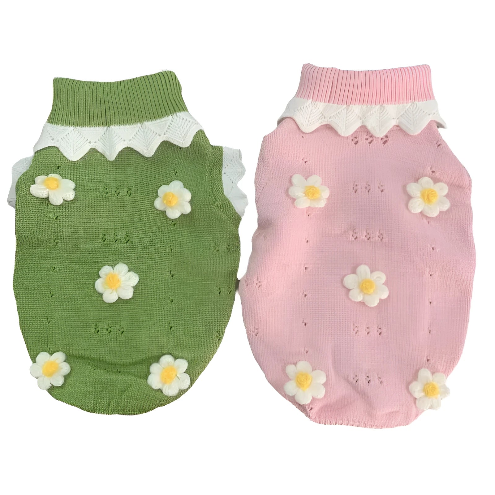 Pink knitted dog sweater with a flower blossom pattern, shown on a small dog.