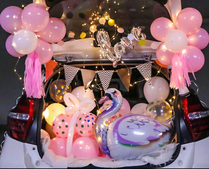 Romantic car trunk proposal decoration kit with balloons, ribbons, and accessories for creating a magical surprise