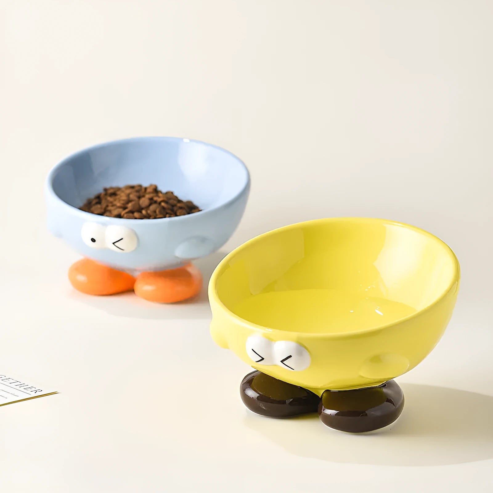 Ceramic pet bowl with oblique tall design in blue colour for cervical spine protection