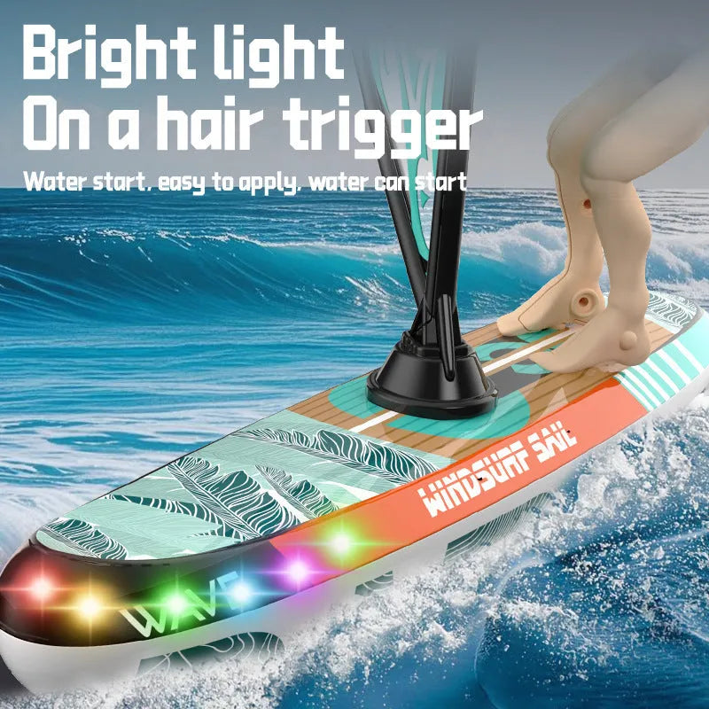 Blue high-speed electric remote control sailboat toy with plastic body on water surface