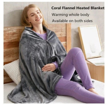 A cozy, grey heated blanket made of soft coral fleece with USB power and adjustable heat settings