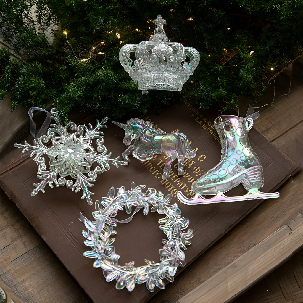 Colourful transparent acrylic Christmas hanging decorations in assorted festive shapes for tree and window displays