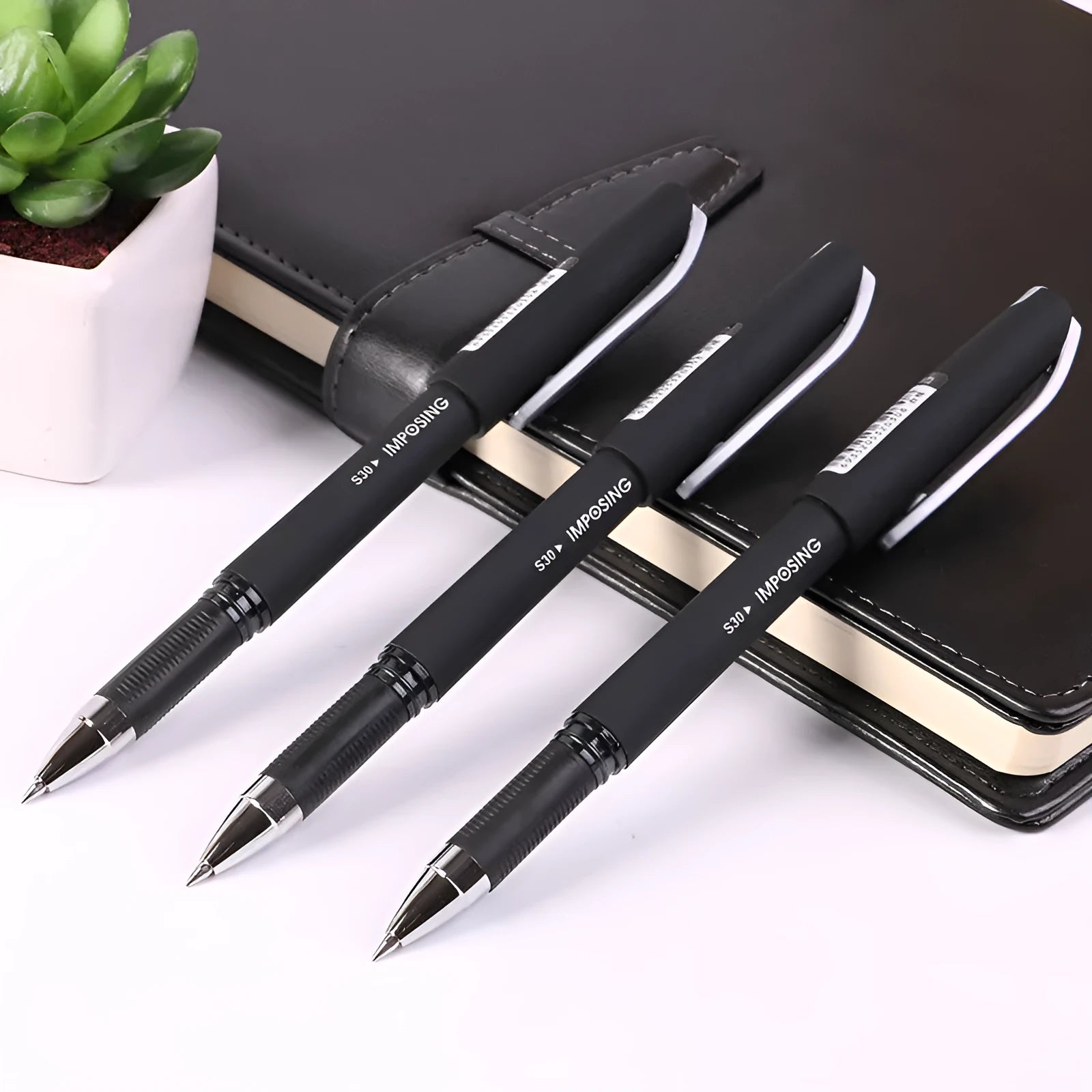 Frosted black 0.5mm quick dry business pen on white background