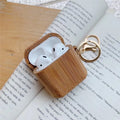 Wood grain AirPods case cover in carbonised wood colour with clamshell design